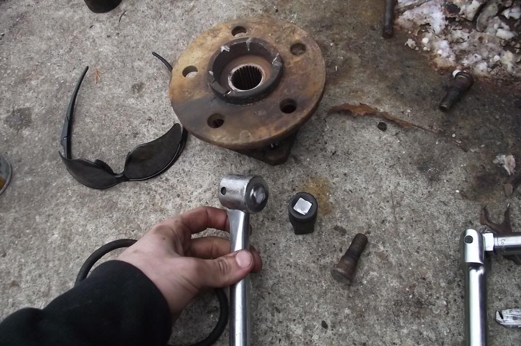 Really stuck axle nut... How can I get this motha' off? NASIOC