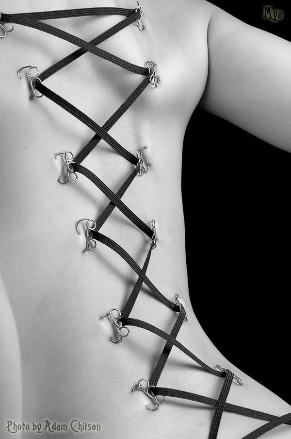 body piercing corset. sexiest ody piercing hot