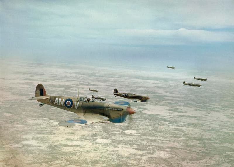 http://i152.photobucket.com/albums/s199/guppy35/315%20Squadron%20RAF/Supermarine%20Spitfire%20Mk%20Vbs%20of%20No%20417%20Squadron%20Royal%20Canadian%20Air%20Force%20flying%20in%20loose%20formation%20over%20the%20Tunisian%20desert%20p_zpsylouexno.jpg